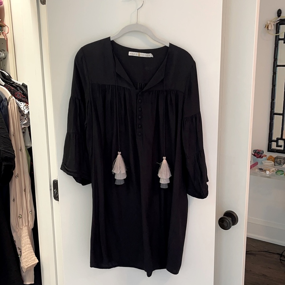 Black dress with tassel details